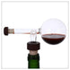 Wine aerator demonstration with red wine showing instant aeration effect