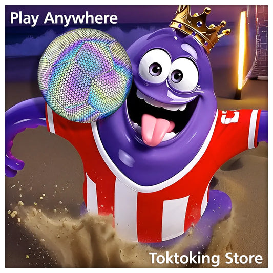 Glimbo King purple mascot jumping to head reflective glow soccer ball on beach at twilight with ocean waves background