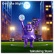 Reflective night soccer ball glowing like trophy on urban rooftop field with illuminated city background