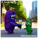 Glimbo King passing white kitten to Glimby on city street - trust and care moment with cat carrier backpack